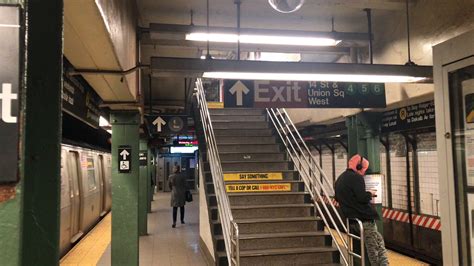 Subway Train Leaving The Station Platform On 14th Street In New York