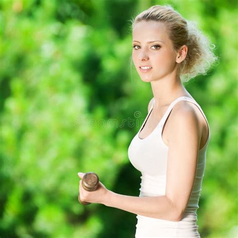 Woman Doing Dumbbell Exercise Outdoor Stock Photo Image Of Dumbbells
