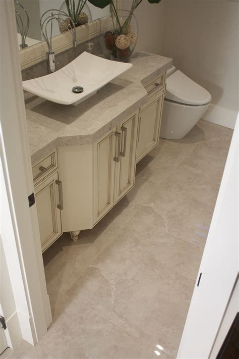 Price and stock could change after publish date, and we may make money from these links. Entry powder room with large 32" x 32" floor tile with ...