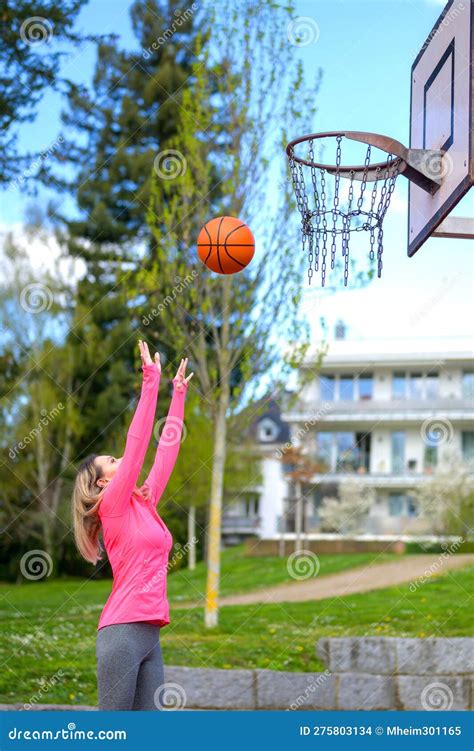 Woman Playing Basketball On A Sports Field Stock Photo Image Of Field