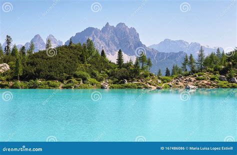 Turquoise Sorapis Lake With Dolomite Mountains Italy Europe Stock
