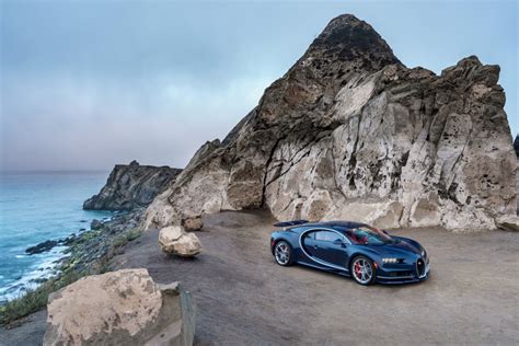 Download 3840x2160 Bugatti Chiron Dark Blue Ocean Rocks