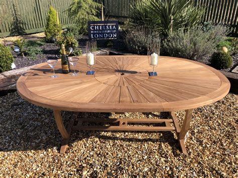 Premium Oval Table With 8 Teak Stacking Chairs