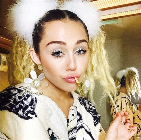 Miley Cyrus Strips Down To Her Underwear As She Recreates Raunchy