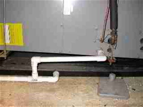 My a/c drip spout is making a puddle next to my foundation. Condensate drip trays: Air Conditioning / Heat Pump ...
