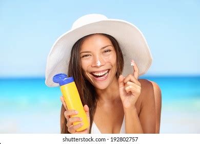 Sunscreen Woman Applying Suntan Lotion Showing Stock Photo Shutterstock