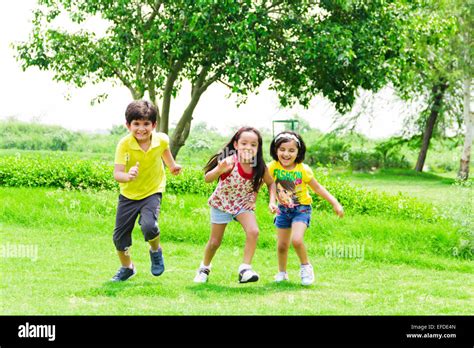 3 Indian Children Friends Park Running Stock Photo Alamy