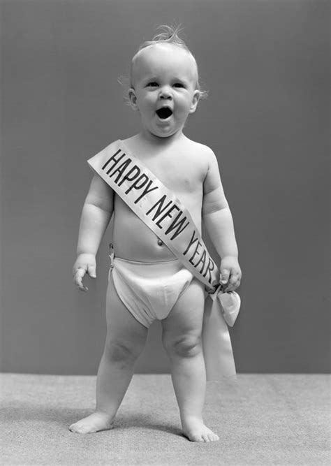 1940s Baby Standing In Diaper Yawning Wearing Happy New Year Sash