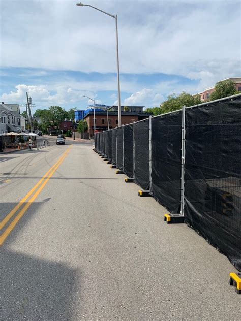 They are based out of nashua, new hampshire and have stockade fence. Block & Panel Fence Rental - Mobile Fencing Inc - RI, MA ...