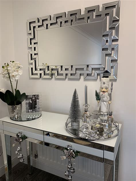 Venetian large mirror with a mirrored white console table and Christmas