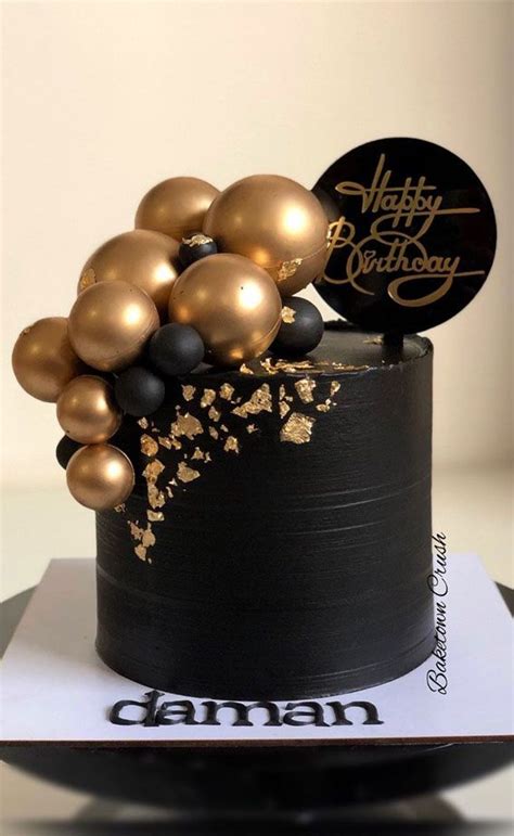 Black Birthday Cake Topped With Gold Balls We Love To Eat Cakes No Matter Whatever Their Age