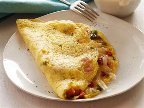 An omelette makes a fantastic breakfast seasoned with just salt and pepper, but it's also a mighty fine delivery vehicle for anything from diced ham to sautéed mushrooms, eaten any time of day. Western Omelette Recipe | Food Network Kitchen | Food Network