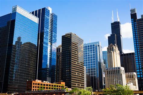 Chicago skyline over lake michigan. Chicago Skyline Downtown City Buildings Photograph by Paul Velgos