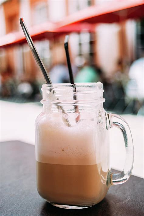 I use vanilla soy milk for sweet iced coffee and plain cream for not sweet. Iced Coffee In Mason Jar Photograph by Pati Photography