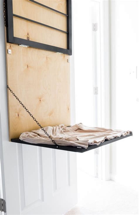 A laundry rack is a must for every home that features a washing machine. DIY Pulldown Hanging Drying Rack-24 | By Brittany Goldwyn | Live Creatively