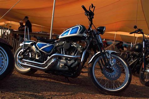 But a subtle stretch that lifts the front of the bike slightly looks pretty rad. Any info about this custom Sportster? White & Blue with a ...