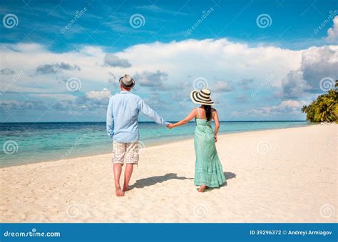 Vacation Couple Walking On Tropical Beach Maldives Stock Photo Image Of Romantic Getaway