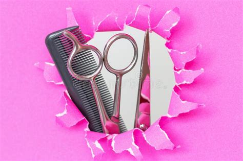 Hair Comb And Scissors On Pink Background Front View Stock Image