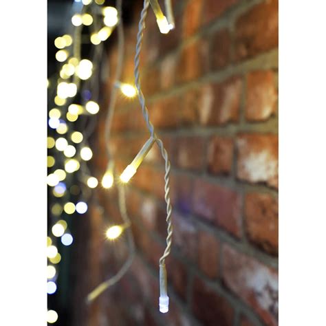 720 Warm White And White Twinkling Led Icicle Lights With Timer 1716m