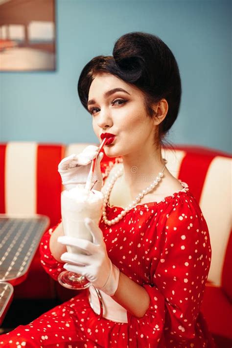 Pin Up Girl Drinks Milkshake Through A Straw Stock Photo Image Of