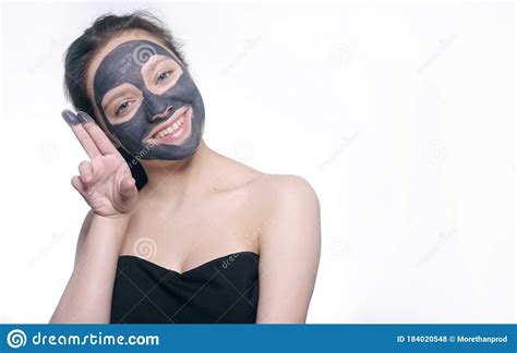 Teenager Girl In A Black Mask Natural Photo Of A Real Mask On A Young