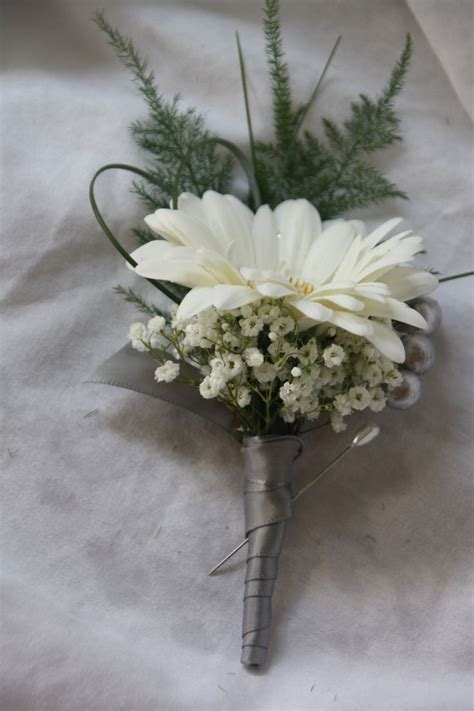 We did not find results for: Gerber daisy boutonniere, but with blue accents instead of ...