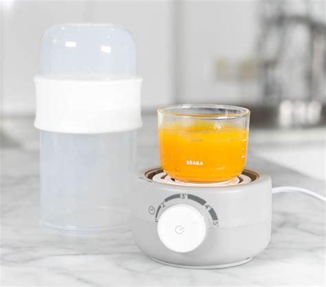 Using things you've already got (you did remember to buy baby bottles before you had your baby, right?) you can safely warm up a bottle. Béaba BabyMilk Bottle Warmer | Pottery Barn Kids