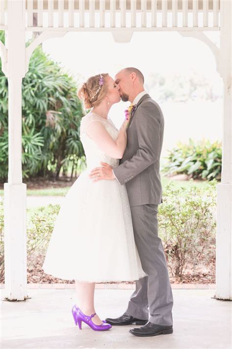 Newlyweds Share Their First Kiss During Their Ceremony At Cypress Grove