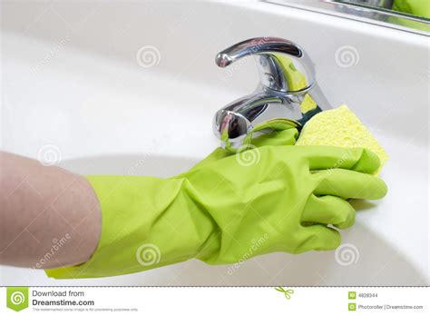 To clean bathroom sink faucets: Cleaning Bathroom Sink stock photo. Image of guarantee ...