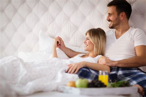 Romantic Couple Having Breakfast In Bed Stock Photo Image Of Home