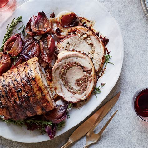 Then it's roasted—initially at a very high temperature to brown the exterior, and then finished at a very low temperature to break down the connective tissues, maximize. porchetta recipe batali