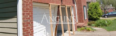 Struts are normally two inches shorter than the door width. Garage Door Opening Repair - Settling, Cracking, Bricks ...