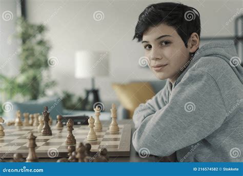 Happy Boy Playing Chess At Home Stock Photo Image Of Chessboard