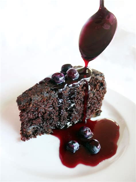 This Chocolate Cake Has Blueberries In The Batter And Is Served With An