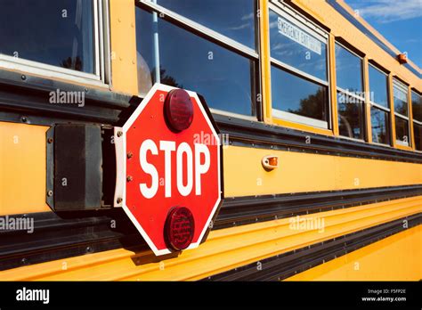 Stop Sign With Red Lights On The Side Of The School Bus Stock Photo Alamy