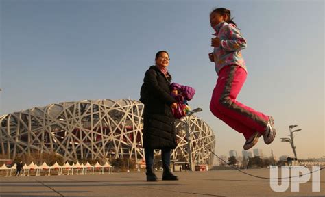 Photo A Chinese Girl Jump Ropes On The 2008 Olympic Green In Beijing
