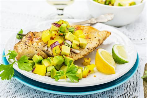 Spoon the salsa over the chicken and serve. Grilled Chicken Breast With Fresh Mango Salsa Stock Image ...