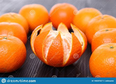 Peeled Orange Fruit Citrus Tankan Against Dark Background Stock Image