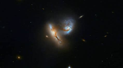 Wow See Two Galaxies Colliding As Seen By Nasas Hubble Space