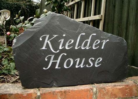 The domain name eulenhaus.com is for sale. Inspiration: Beautiful Stone House Signs from Rustic Stone