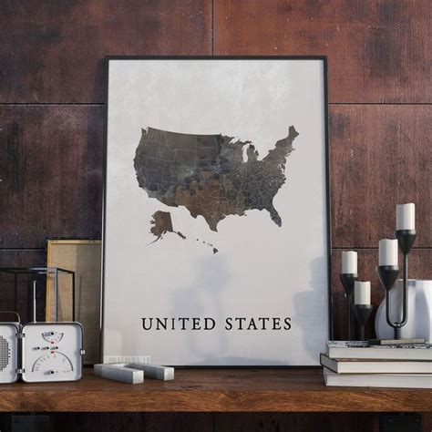 A Map Of The United States Is Displayed On A Shelf Next To Other Items