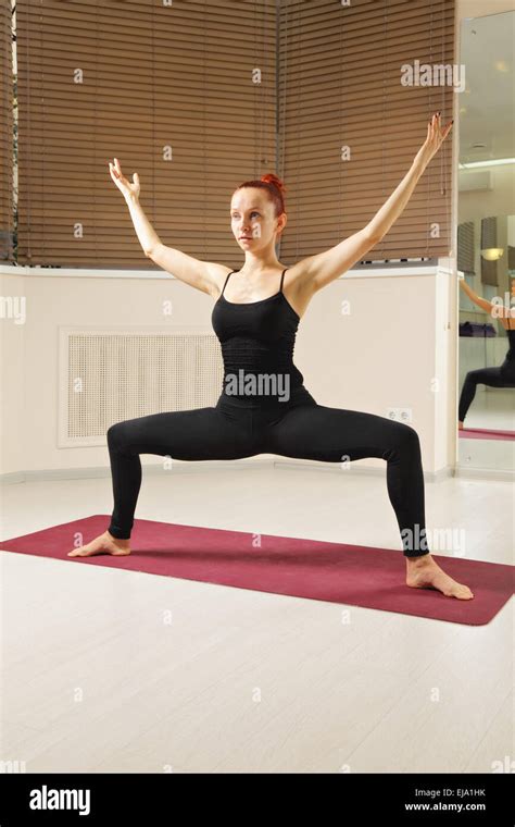 Standing Yoga Pose Arms Raised Stock Photo Alamy