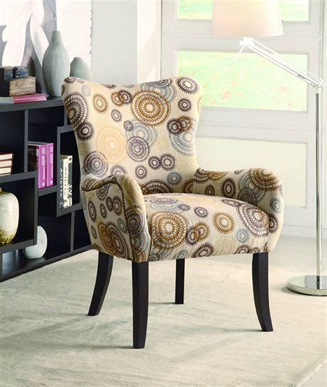 If you have a solid color sofa or sectional, find a patterned accent chair that incorporates the solid color of your other furniture. Plush Patterned Accent Chair, Beige Circles | Marjen of ...