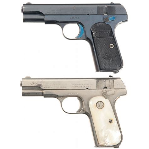 Two Colt 1903 Pocket Hammerless Semi Automatic Pistols A Colt 1903