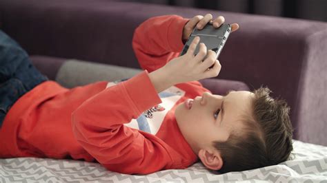 Boy Playing Mobile Game On Smartphone On Stock Footage Sbv 330813982