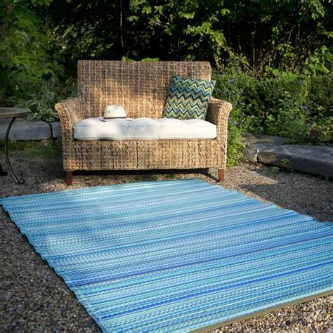 Choose a bright and bold color outdoor rugs can give your space a colorful and stylish look when positioned to around a large deck or patio. Turquoise, moss plastic outdoor rug, patio rug, indoor ...