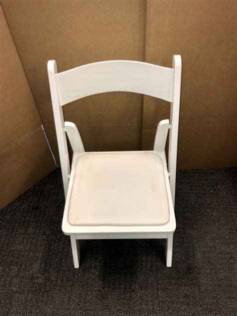 Folding chair isolated on white. White Wooden Padded Folding Chairs - Predominantly Office