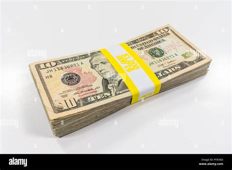 Pack Of Ten Dollar Bills With 1000 Paper Currency Strap Stock Photo