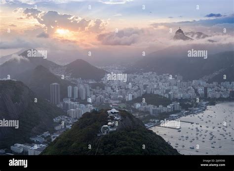 Sunset Over The City Skyline And Rios Mountains And Beaches From The