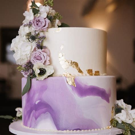 Purple Two Tier Wedding Cake With Gold Foil Accents And White And